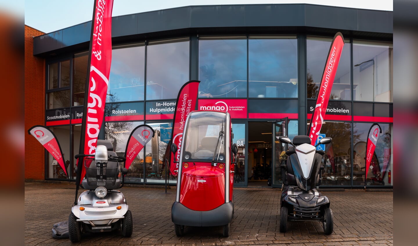Mango Mobility storefront with mobility scooters and products on display
